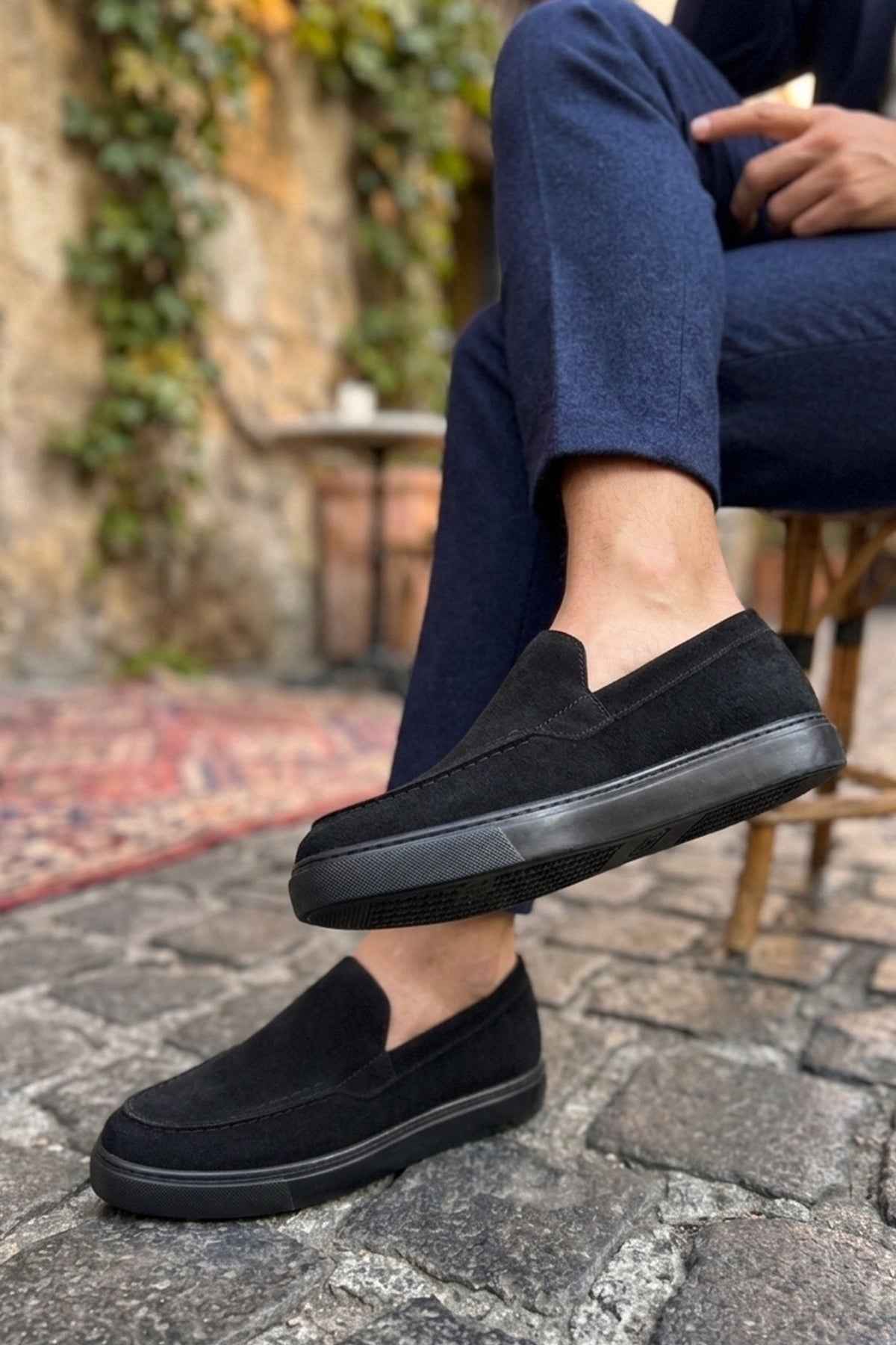 Men's black suede loafers, low-cut upper with side detailing and thick sole
