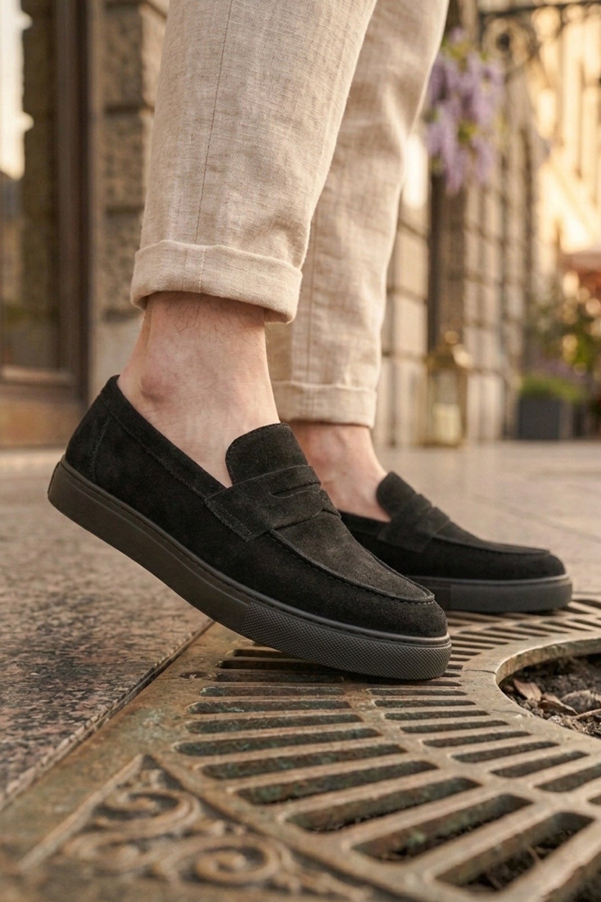Men's black suede slip-on loafer with classic vamp seam