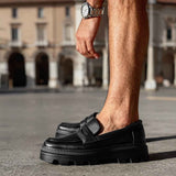 Men's black loafer with strap detail and treaded sole