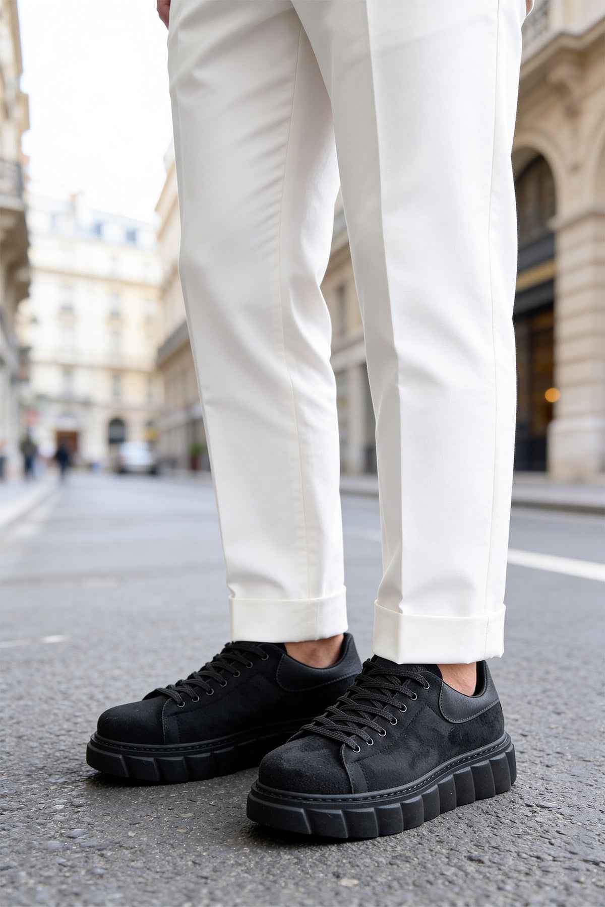 Men's black suede sneakers, lace-up, low-top style with treaded rubber sole