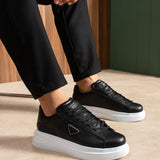 Black lace-up sneakers with white sole, side triangle logo detail