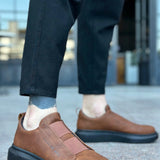 Men's brown casual sneakers with low profile and dark rubber sole