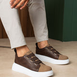 Brown low-top casual sneakers with hook-and-loop straps and white sole