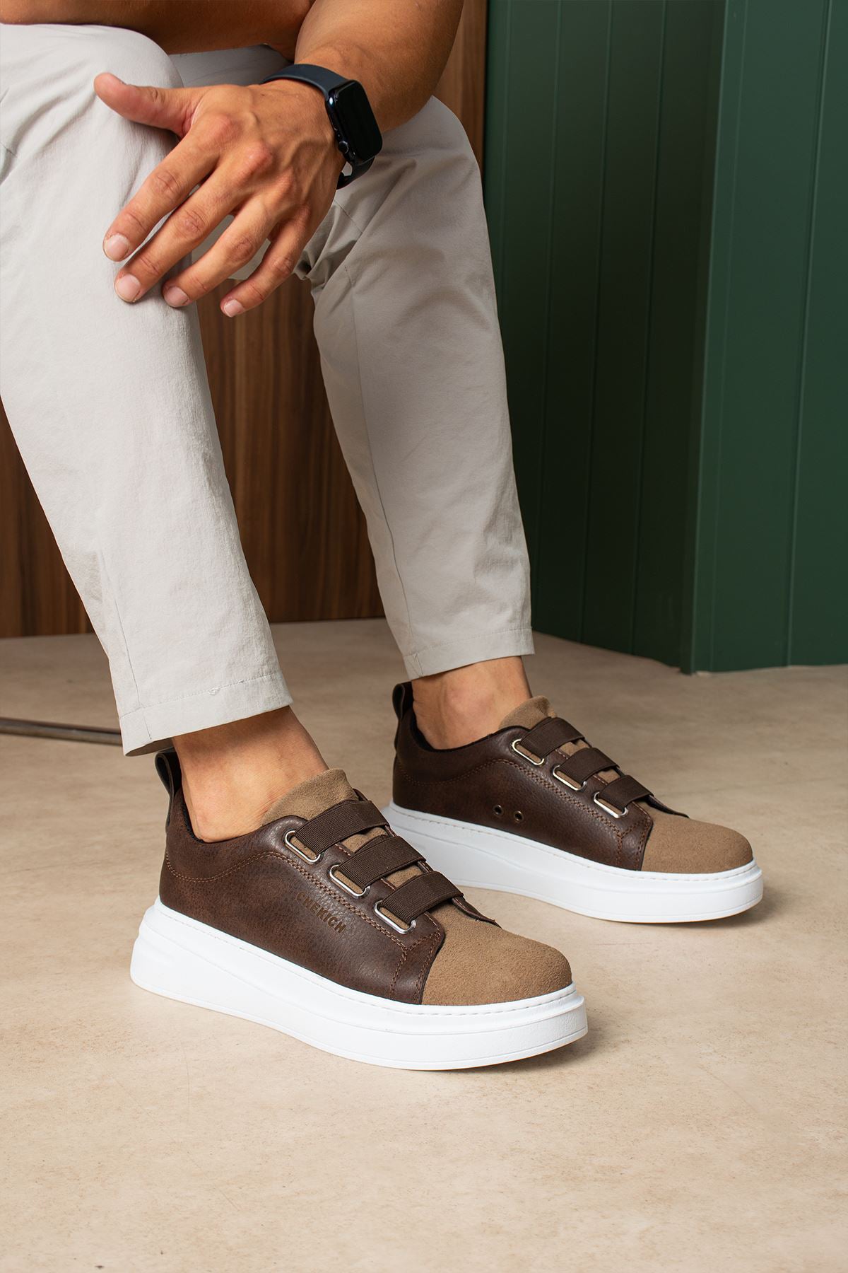 Brown low-top casual sneakers with hook-and-loop straps and white sole