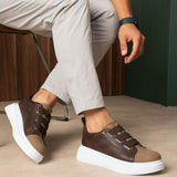 Brown casual sneakers with Velcro straps and white rubber sole
