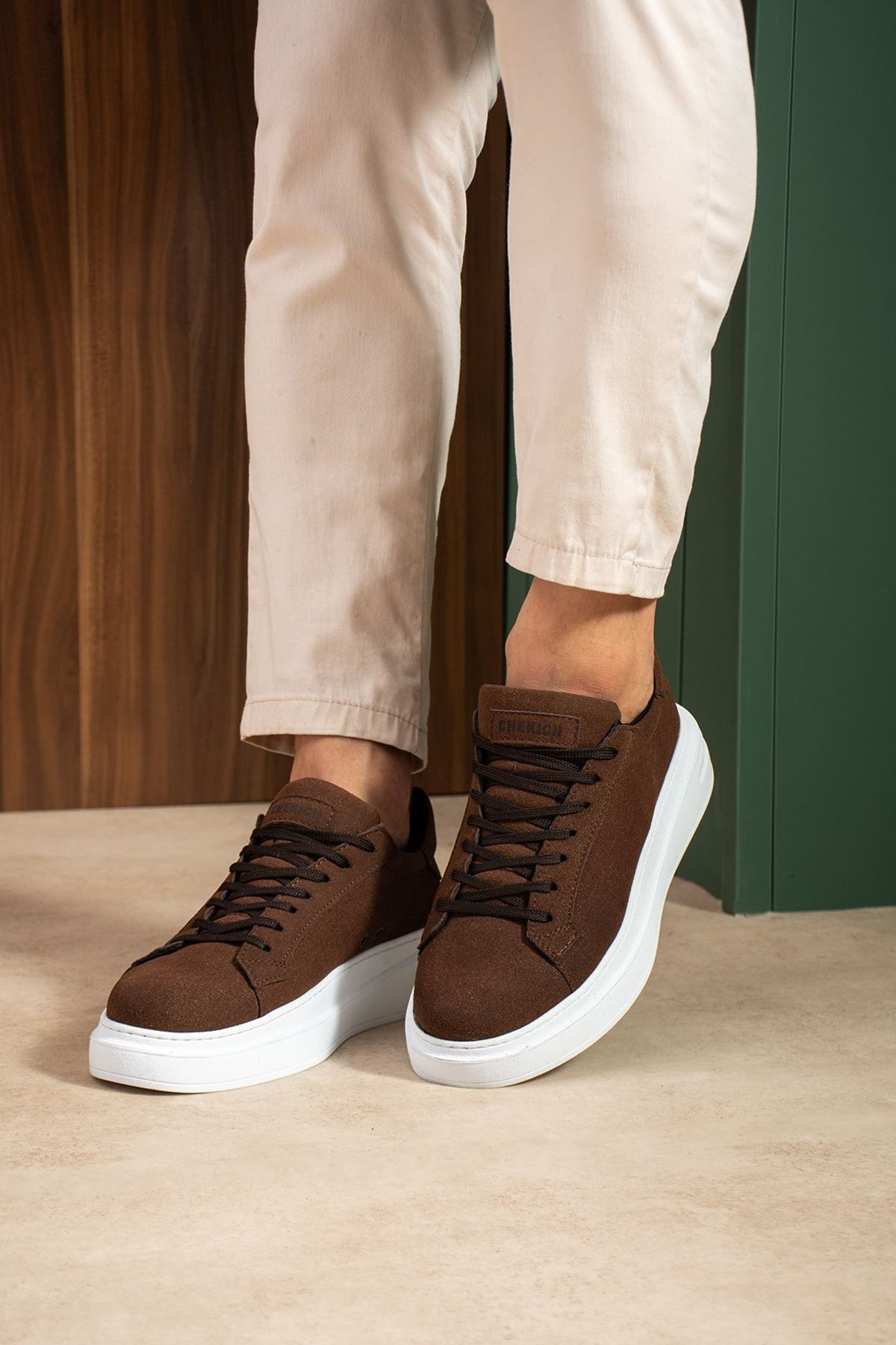 Men's brown suede sneakers, lace-up design with cushioned white sole