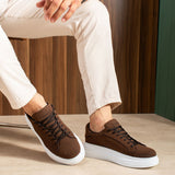 Men's brown suede sneakers, casual lace-up pair with white soles