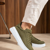 Men's olive suede low-top sneakers, lace-up with white rubber sole, side view