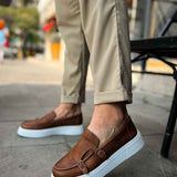 Men's tan casual loafers with buckle strap, front angle, white sole