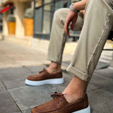 Tan lace-up casual shoes with brown upper and white platform sole