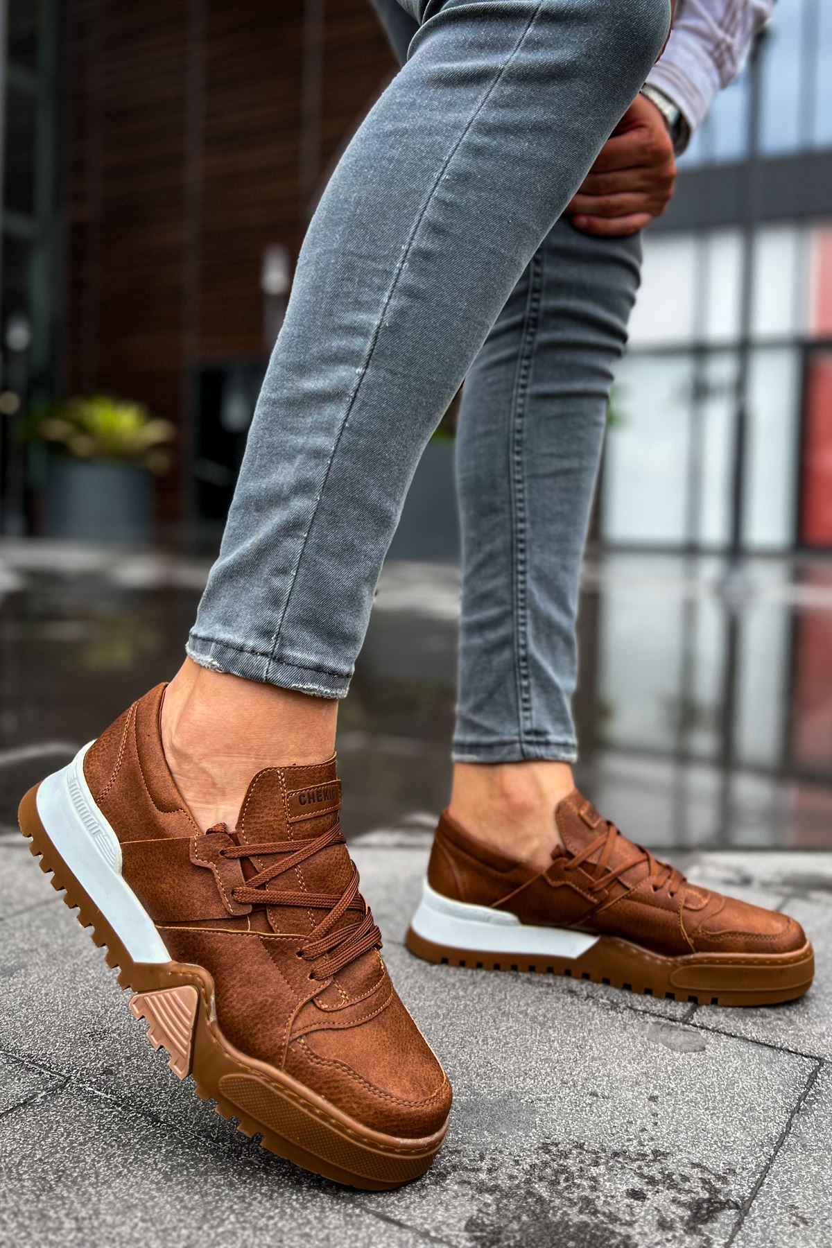 Men's tan casual sneakers with lace-up front and white rubber sole, side view