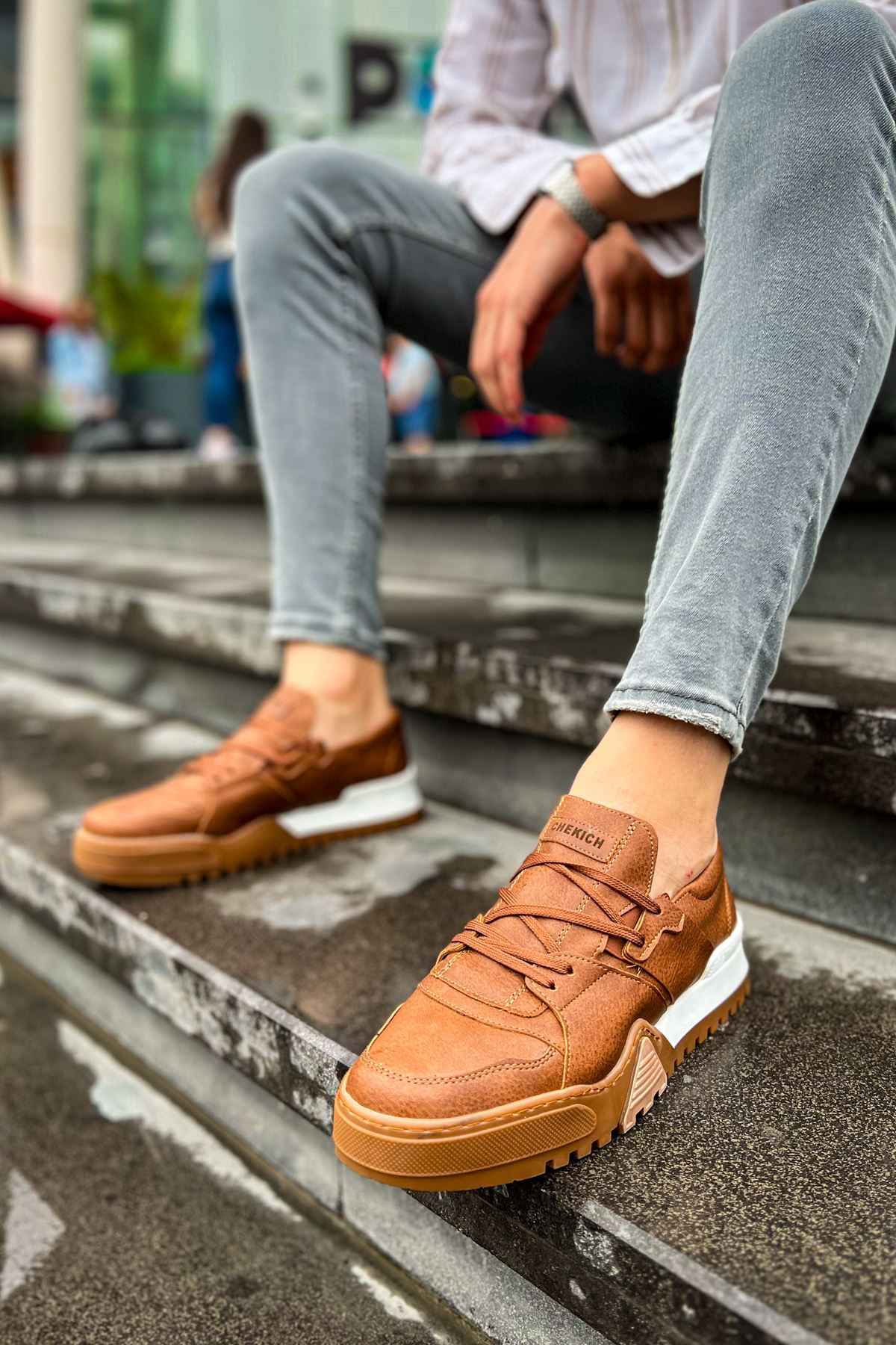 Men's tan lace-up casual sneakers with white midsole, rounded toe