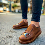 Tan casual sneakers, side view, buckled strap detail and padded collar