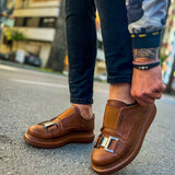 Tan casual sneakers, front view, dual buckle straps and cushioned collar