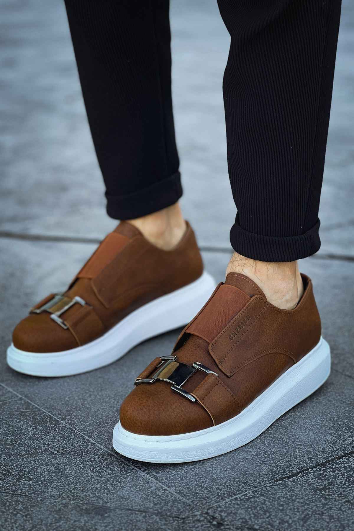 Men's casual tan suede sneakers with white soles and two buckle straps