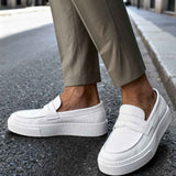 Men's casual white loafers, side view with stitched vamp and slip-on strap