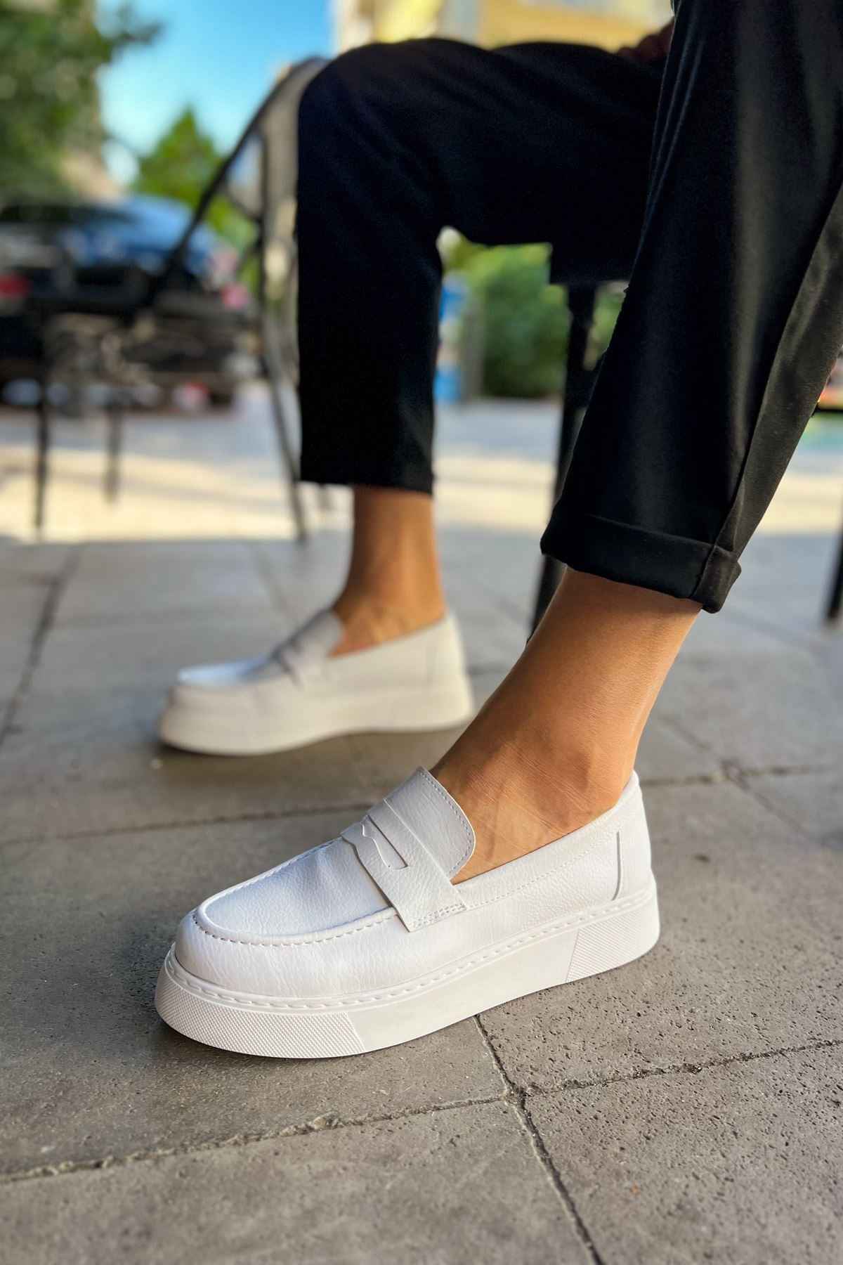 Men's white loafer with strap detail and stitched side panels