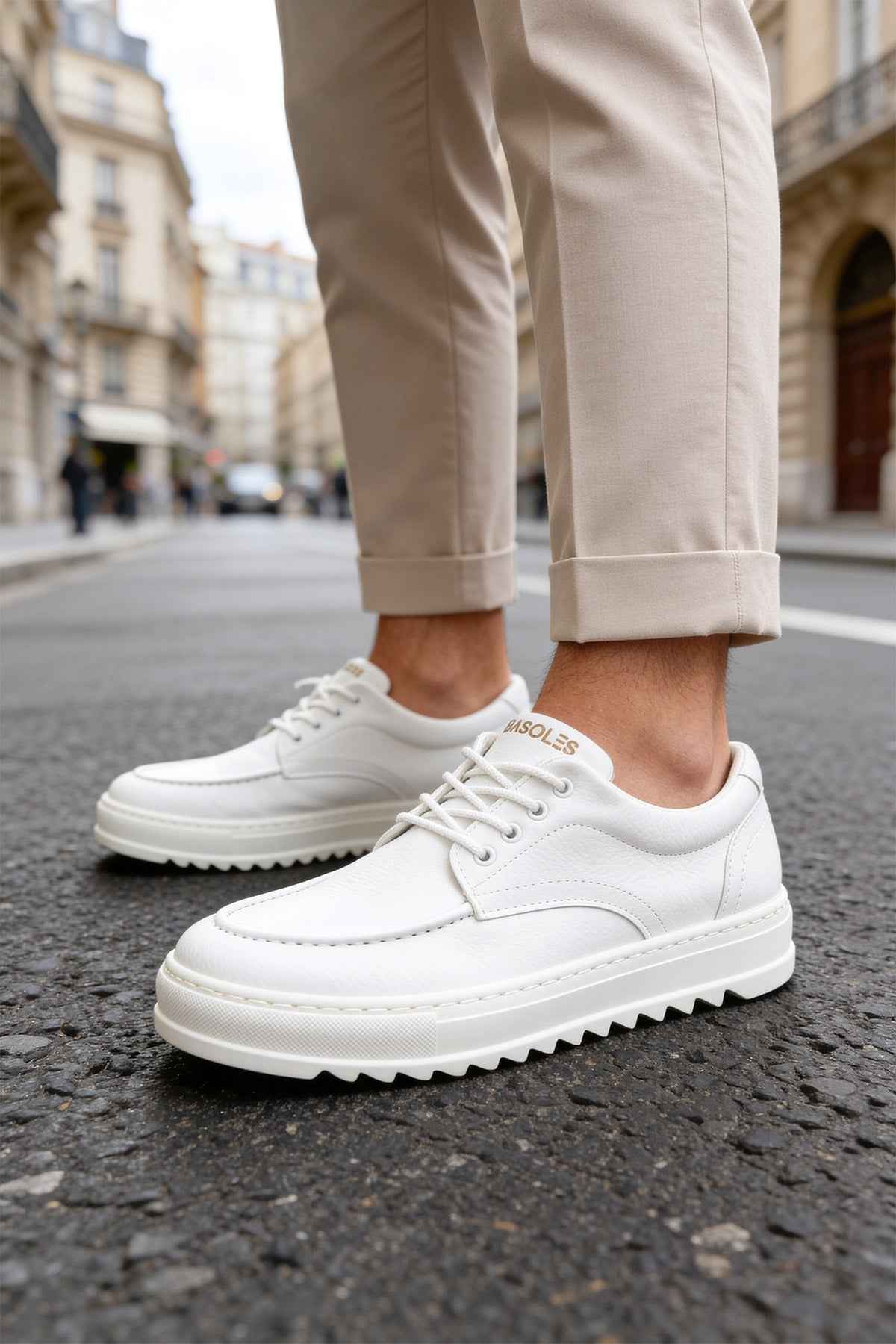 Men's casual white lace-up shoes with thick rubber sole and stitched panels