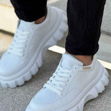 Men's white lace-up sneakers with side stitching and thick platform lug sole
