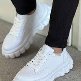 Men's white low-top sneakers, lace-up design with chunky tread and cushioned sole