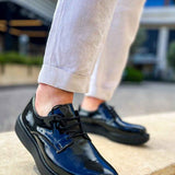 Men's black patent leather lace-up shoes, glossy finish, moc-toe style sole