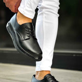Men's classic black lace-up shoes with stitched detail and cushioned sole