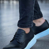 Men's classic black lace-up shoe, side view, light-blue sole