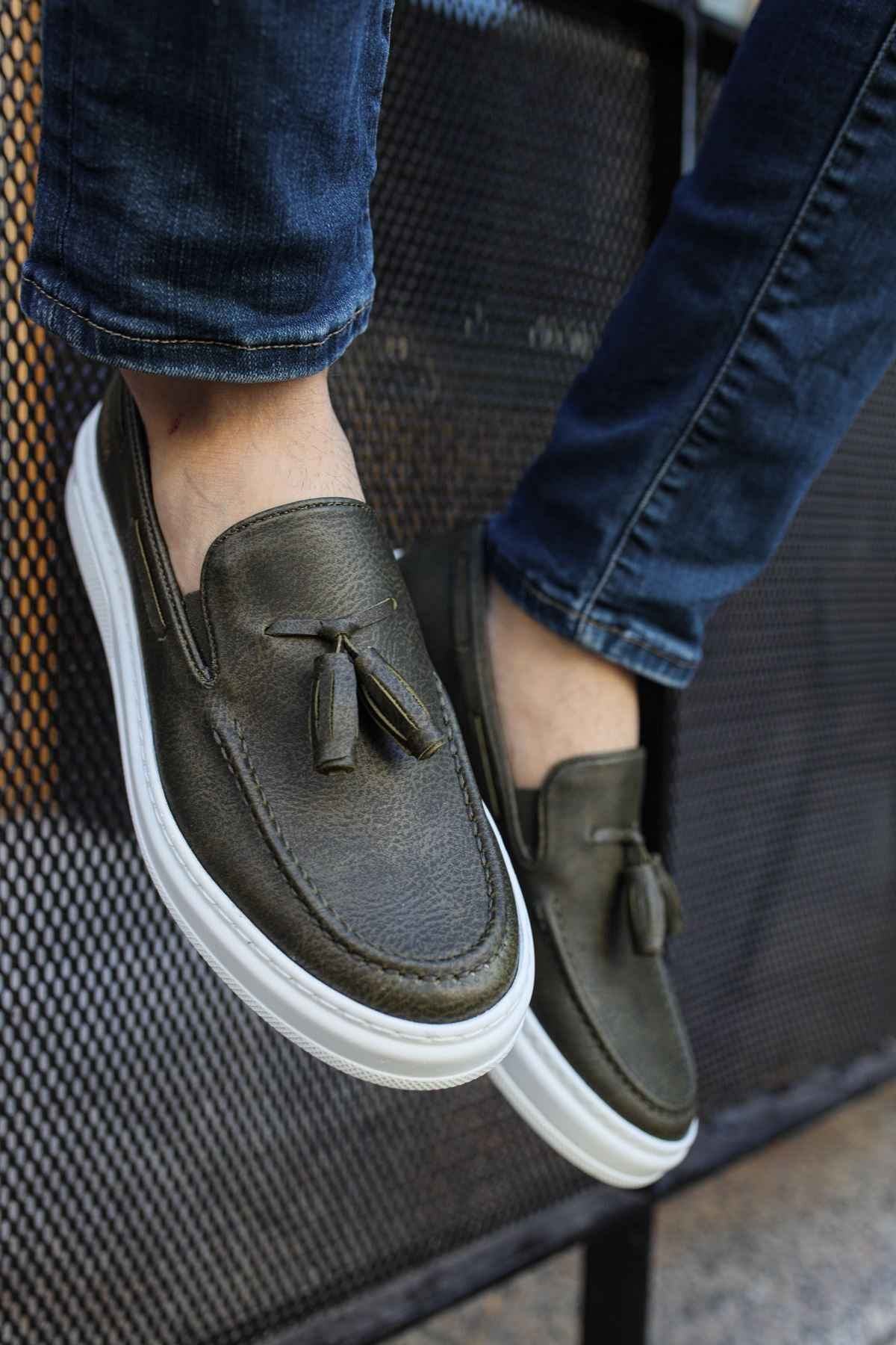 Men's dark khaki tassel loafers with white rubber sole