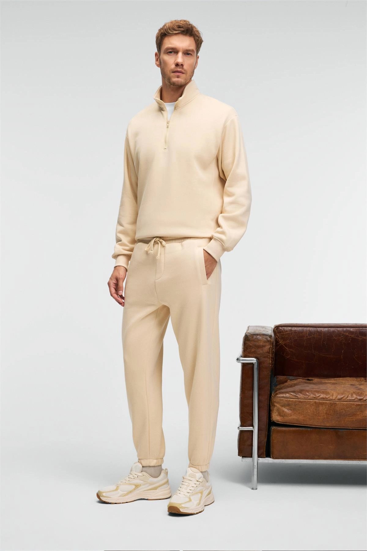 Men's cream zip stand-collar sweatshirt with matching sweatpants, relaxed fit
