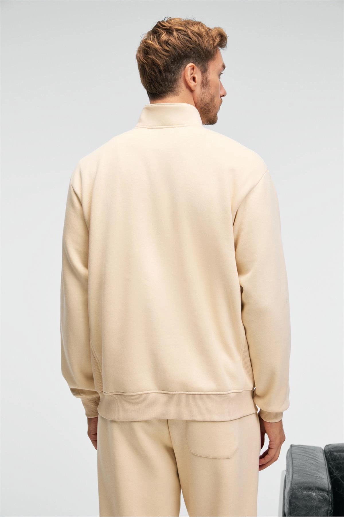 Men's cream zip stand-collar sweatshirt, back view