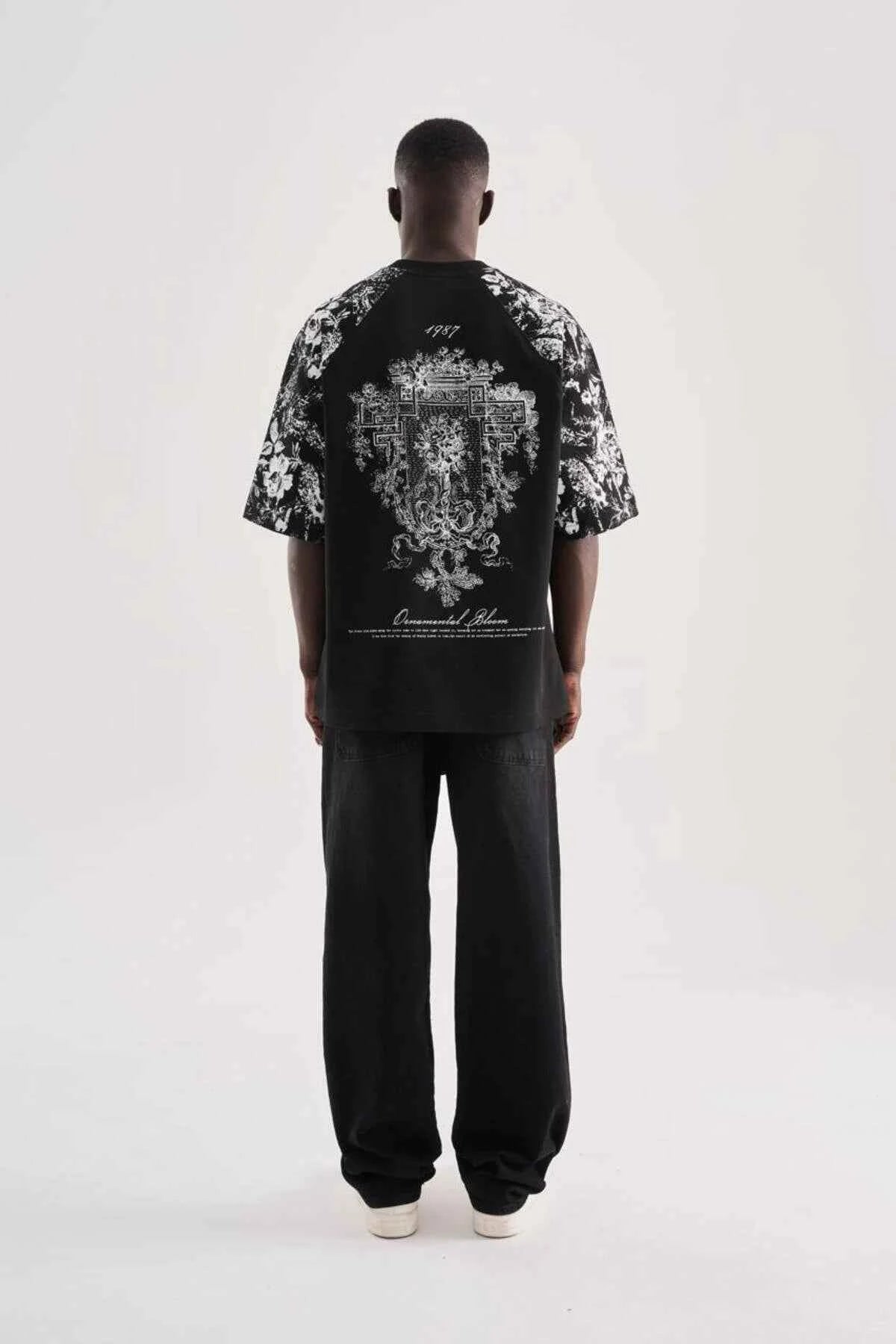 Black oversize men’s T-shirt with central back graphic and floral print sleeves