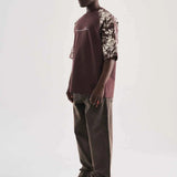 Brown oversize T-shirt with floral print sleeves and chest script logo