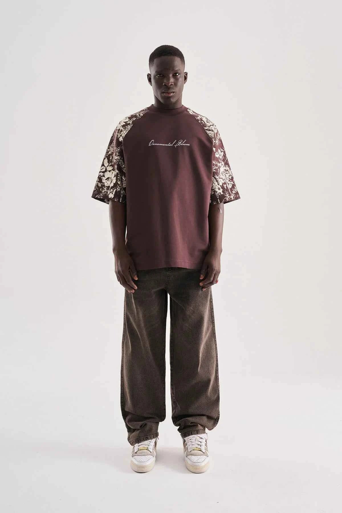 Brown oversize T-shirt with floral print sleeves and chest script graphic