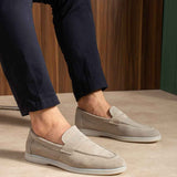 Beige leather loafers, slip-on style with stitched moc-toe detail