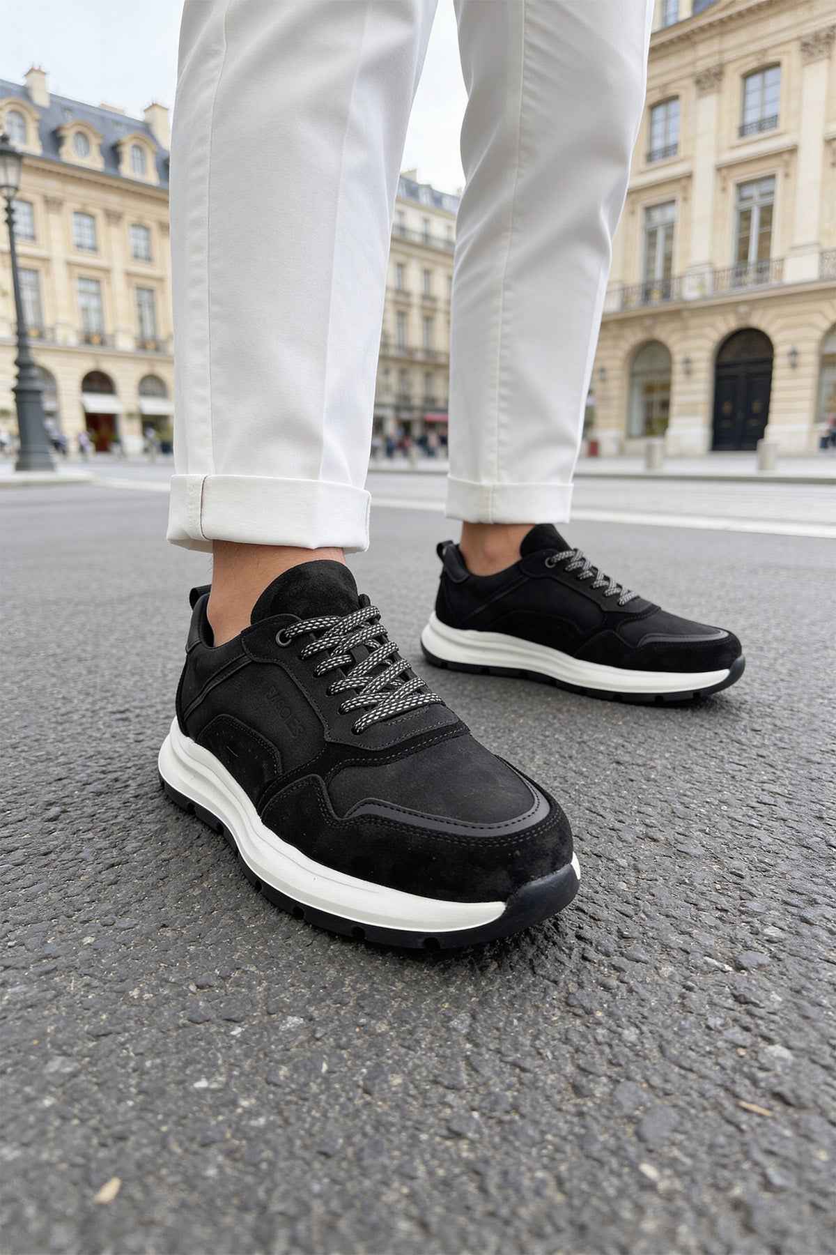 Men's black leather lace-up low-top sneakers with white rubber midsole