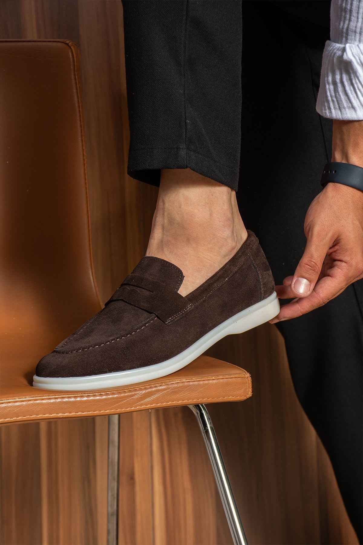 Men's genuine leather loafers, dark brown slip-on with stitched vamp and white sole.