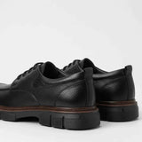 Men's leather lace-up classic shoes in black, back heel view with rubber sole