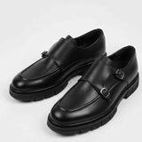 Black leather monk strap shoes pair with double buckles and thick sole