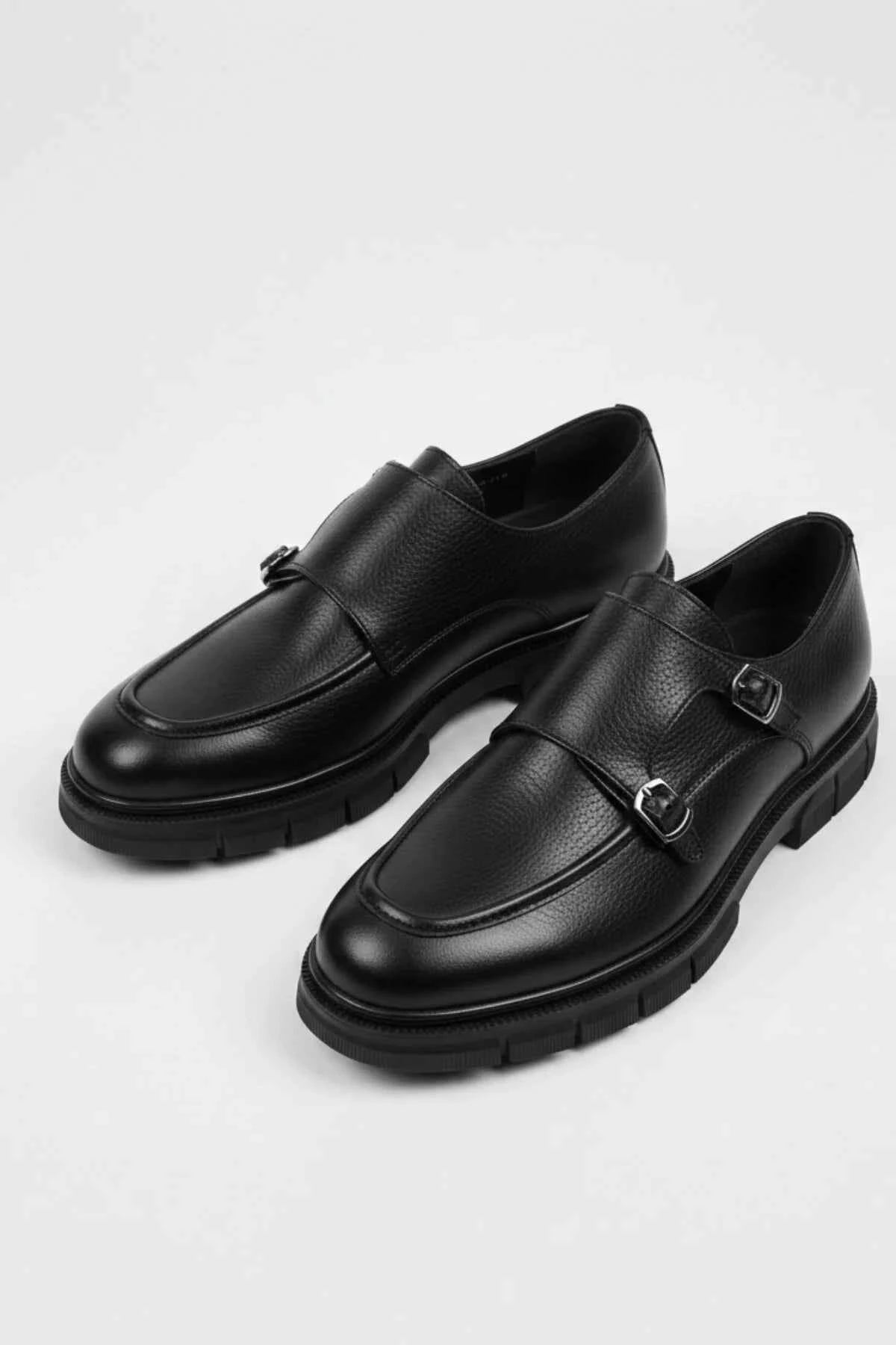 Black leather monk strap shoes pair with double buckles and thick sole