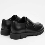 Black leather monk strap shoes, heel and side view with thick sole