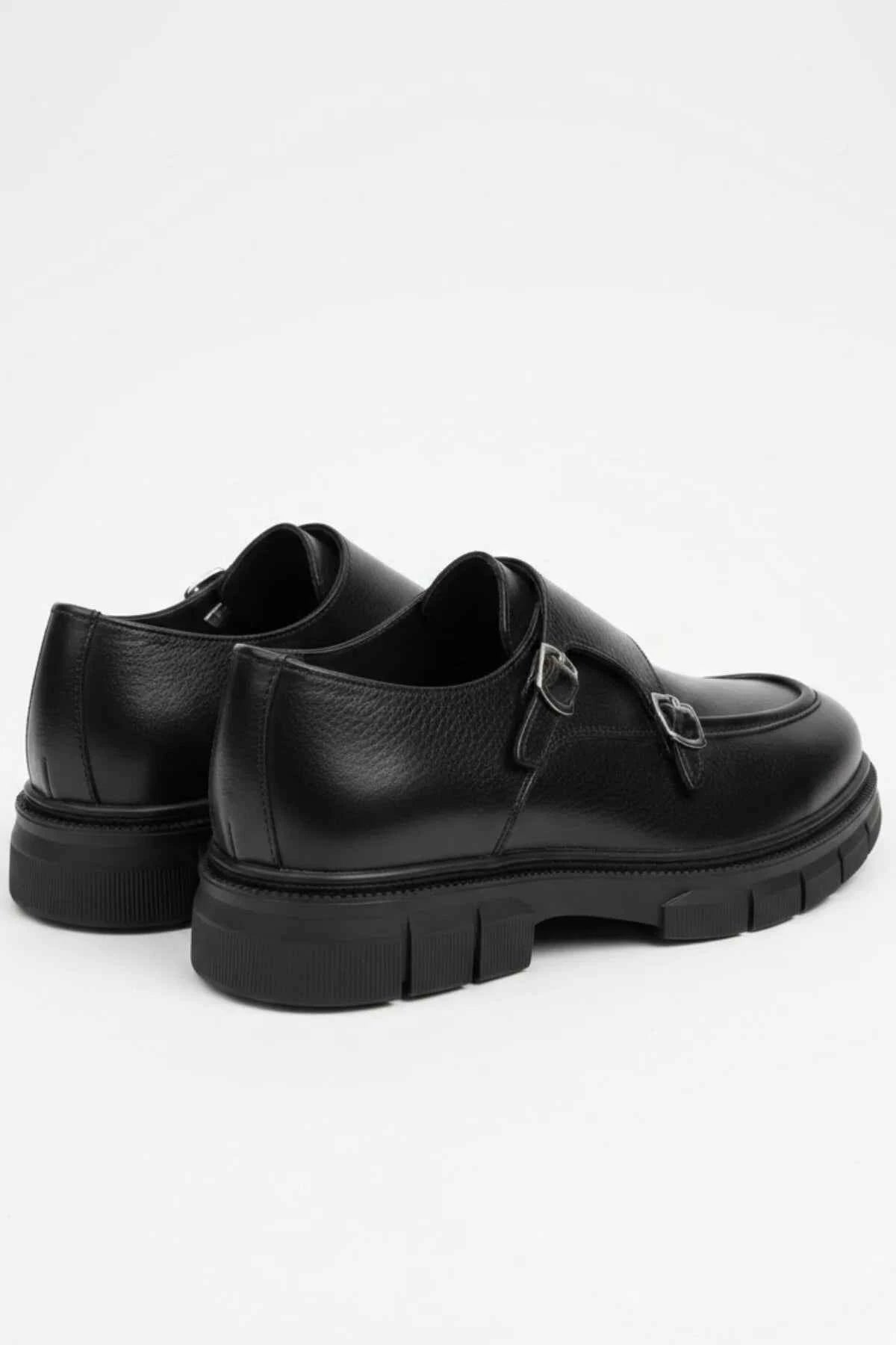 Black leather monk strap shoes, heel and side view with thick sole