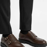 Brown leather double-buckle loafers with thick black sole