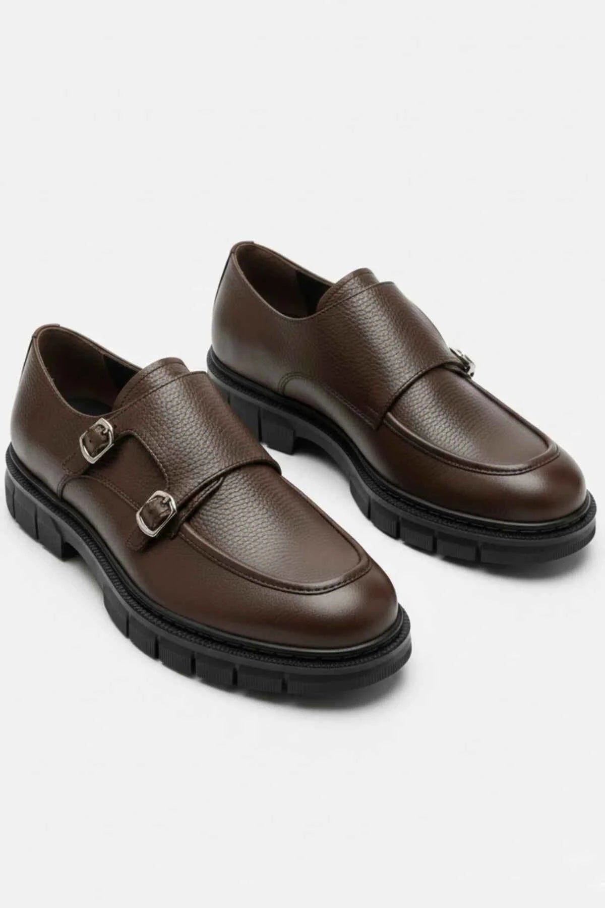 Pair of brown leather double-buckle loafers with black rubber sole