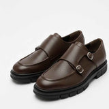 Brown leather double-buckle loafers with smooth upper and black sole