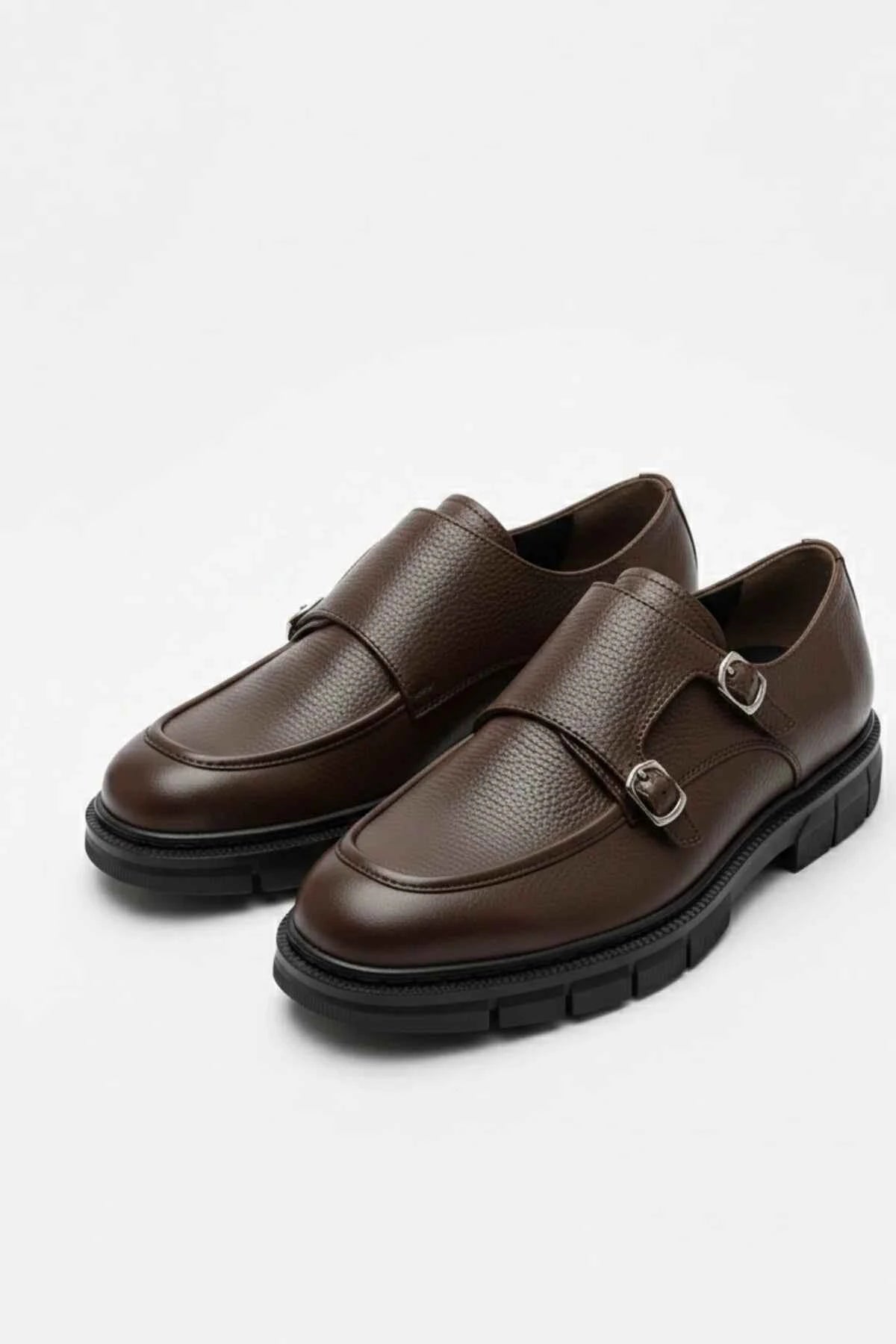 Brown leather double-buckle loafers with smooth upper and black sole