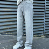 Light gray baggy jeans with roomy wide leg, front pockets and belt loops