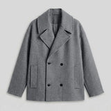 Gray double-breasted coat front with notch lapels, flap pockets, black buttons