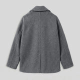Gray double-breasted coat back view with center seam and full-length sleeves