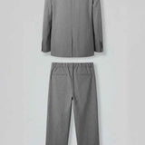Gray oversized suit jacket and wide-leg trousers set, rear view