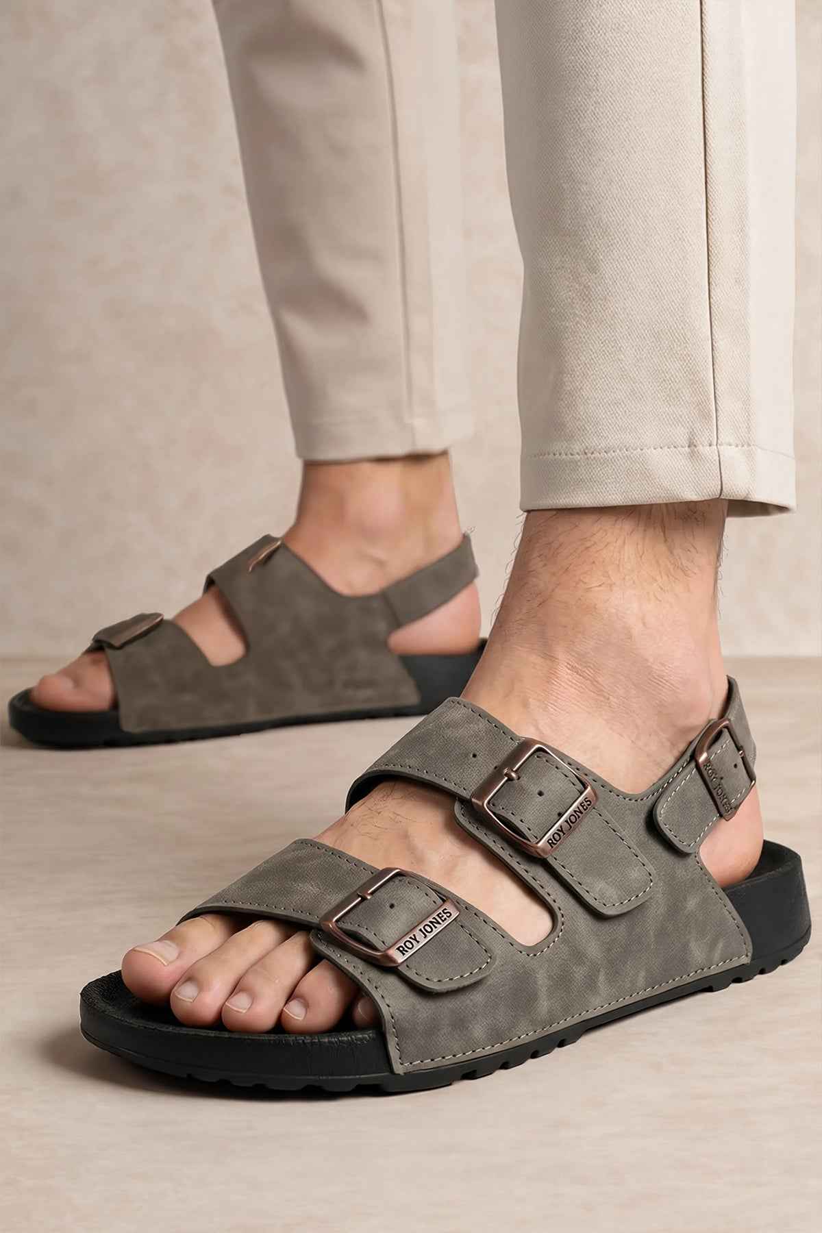 Men's gray open-toe sandals with two adjustable straps and metal buckles
